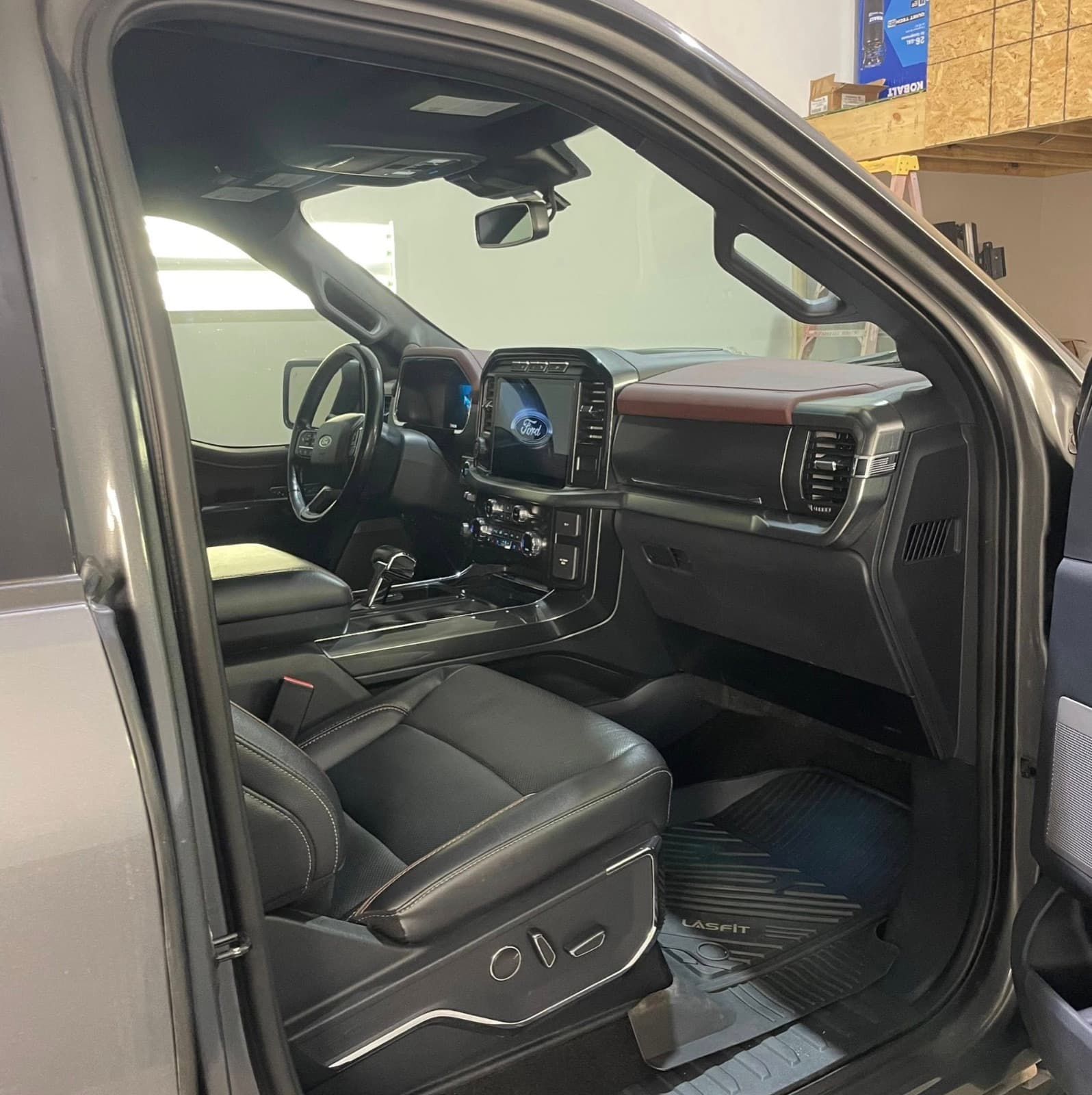Ford F-150 prepped in a covered garage for ceramic coating cure