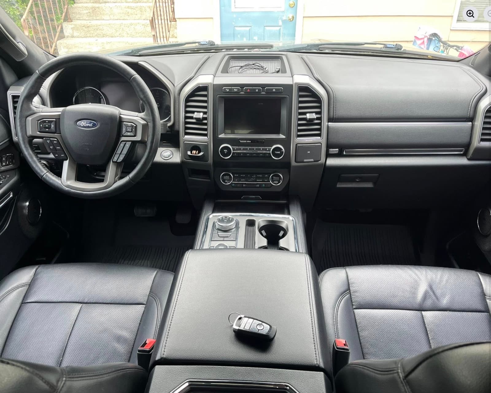 Ford Expedition dashboard and front seats after detail
